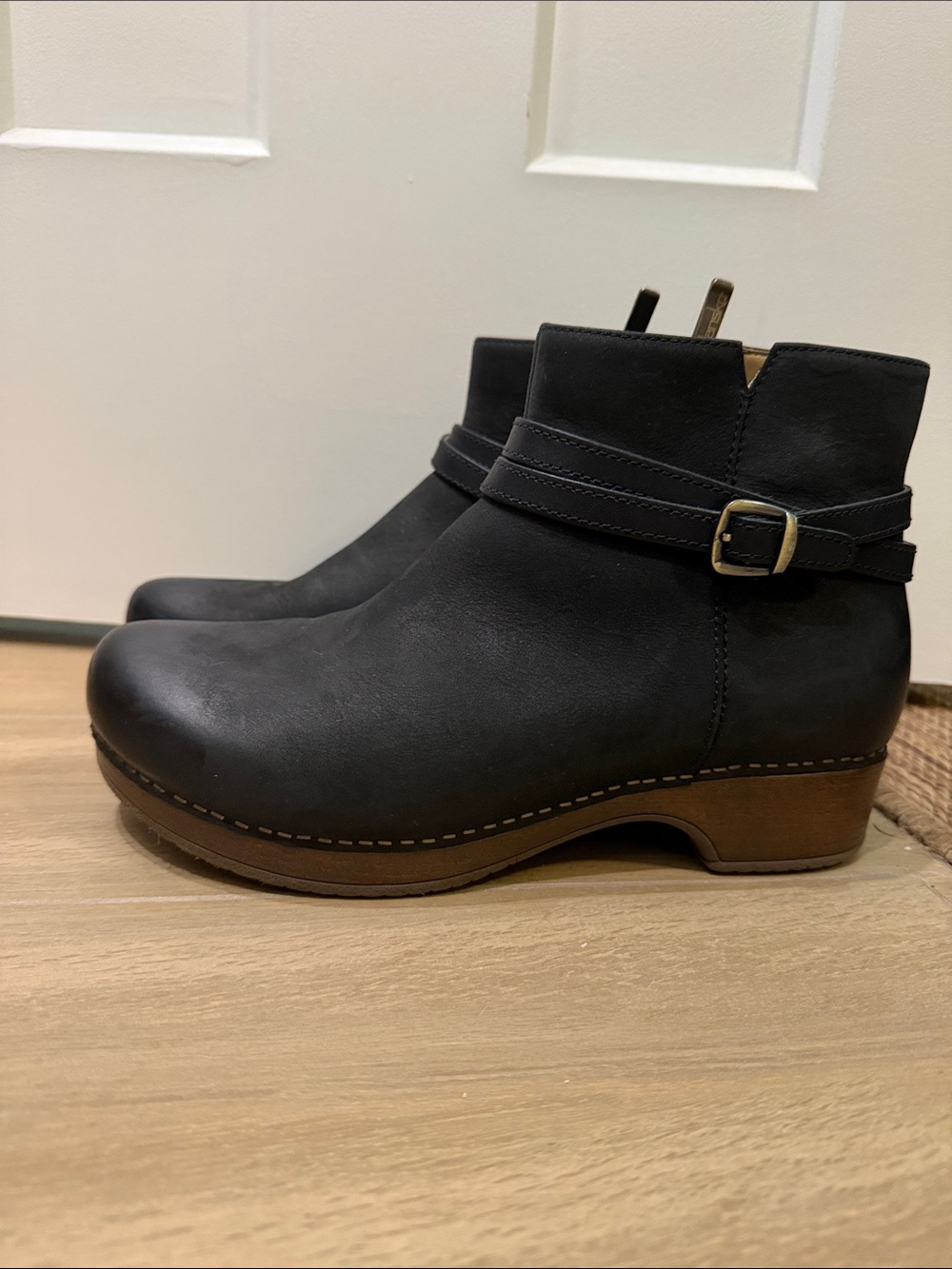 Dansko Black Leather Ankle Booties with Buckle Strap